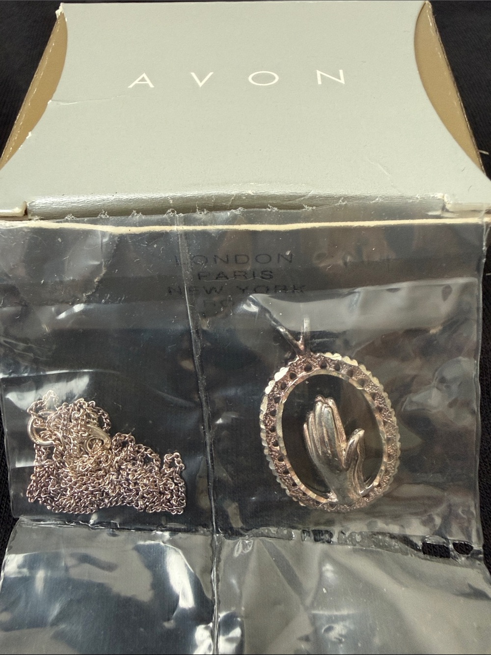 Avon Silver Oval Floral Praying Hands Pendant Necklace